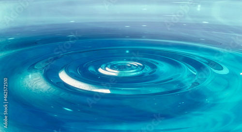 pure blue water circle on the water reflection shine.