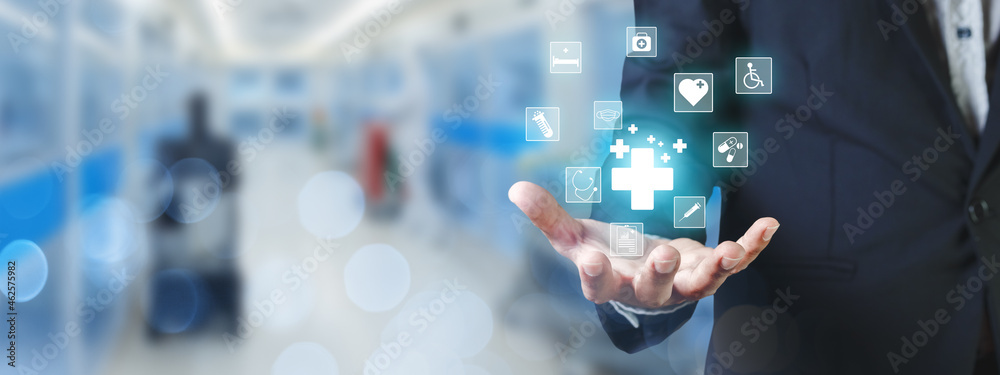 Businessman with medical icons in a hand. analysis technology equipment medicine healthy, business and healthcare concept. - obrazy, fototapety, plakaty 