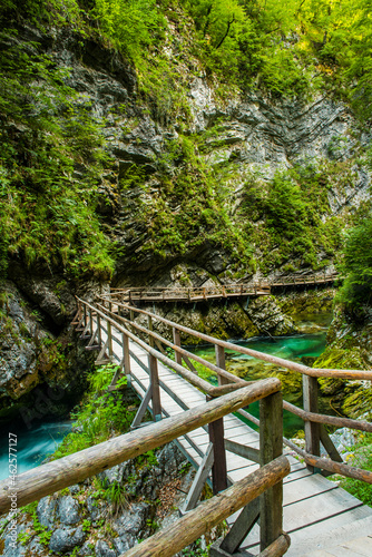 Fototapeta Naklejka Na Ścianę i Meble -  Vintgar Gorge in Slovenia. Wooden Path in Canyon