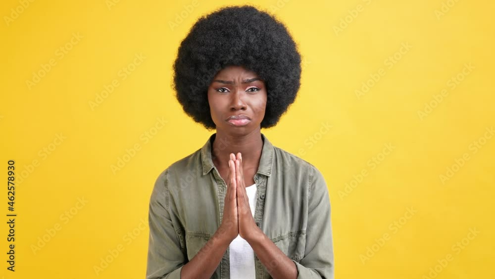 Hopeless desperate lady pout lips hold palms together ask assistance