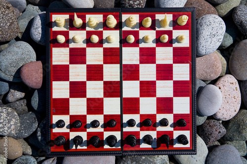 White and black pieces are placed on the chessboard.