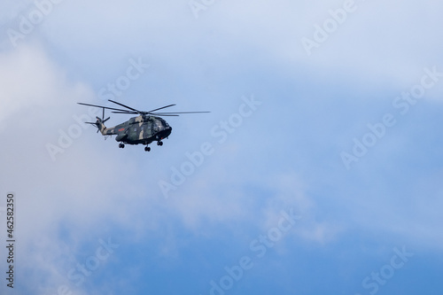 HONG KONG, CHINA - August 07, 2020: People's Liberation Army helicopters patrol over the sky of Hong Kong