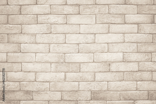 Cream and white brick wall texture background. Brickwork and stonework flooring interior rock old pattern