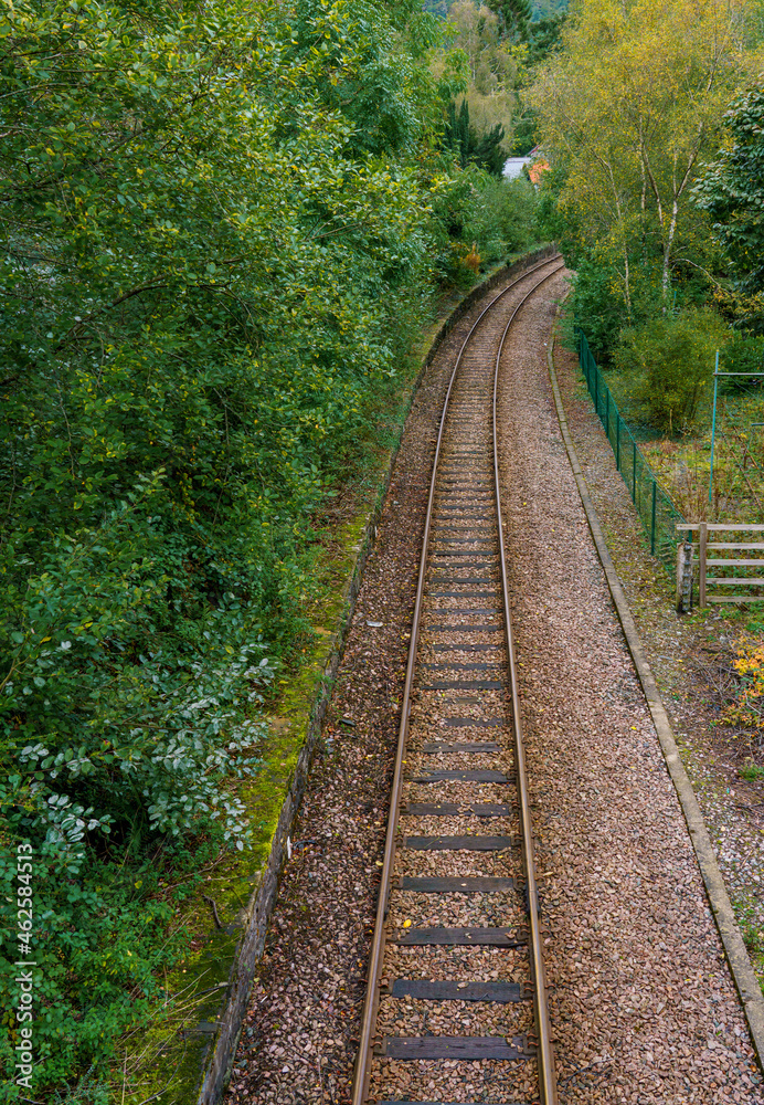 Fototapeta premium Betws-y-Coed railway line just outside the station, a standard gauge line on the Conwy Valley Line from Llandudno Junction to Blaenau Ffestiniog, Wales