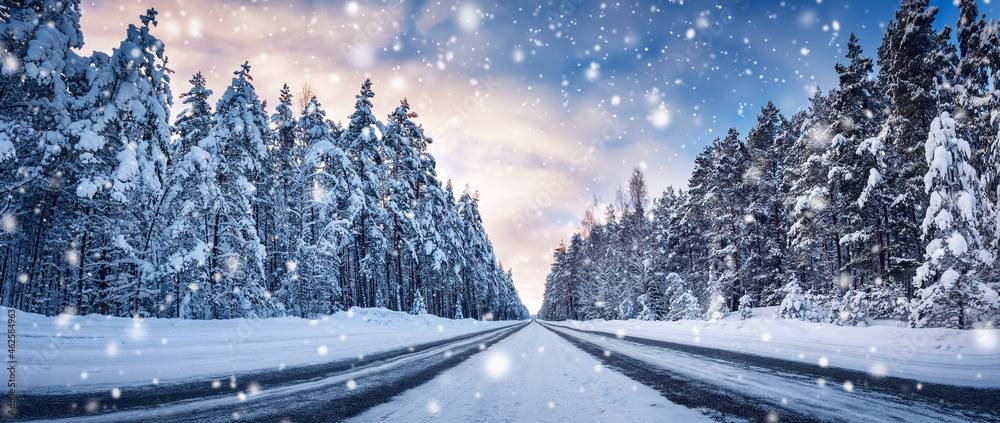 Panoramic view of the beautiful country road in winter in snowfall. - obrazy, fototapety, plakaty 