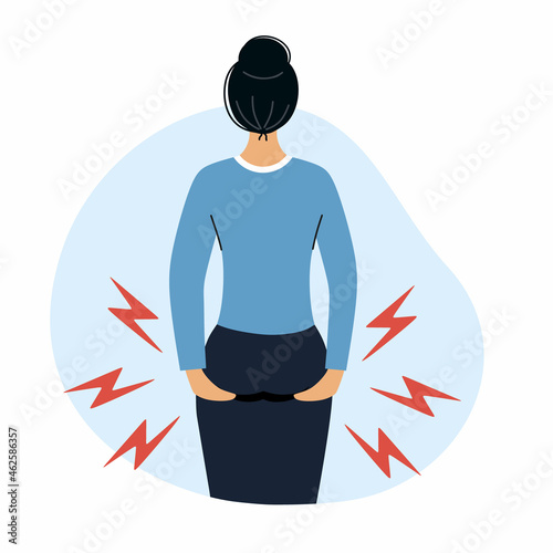 Woman holds her hands bottom. Hemorrhoids and health problems.