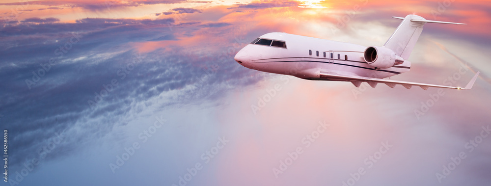Private jetplane flying above dramatic clouds - obrazy, fototapety, plakaty 