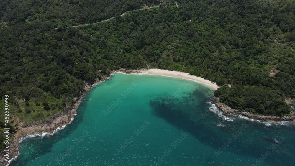 Aerial view zoom in of sand beach and blue ocean Aerial view zoom in of sand beach and blue ocean
