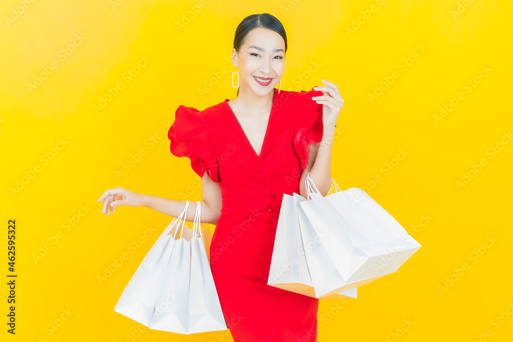 Portrait beautiful young asian woman smile with shopping bag Portrait beautiful young asian woman smile with shopping bag