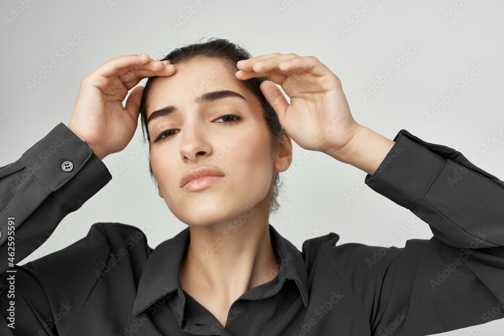 woman in black shirt headache discontent trouble isolated background