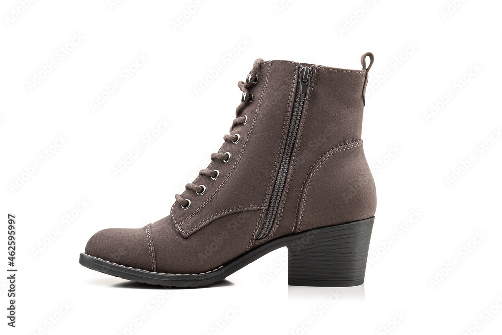 Side view. Women's brown suede shoe with laces and a low wide heel. Zippered shoes. Close-up. Isolated on a white background. Perfect retouching. Copy space. Layout for the design. Side view. Women's brown suede shoe with laces and a low wide heel. Zippered shoes. Close-up. Isolated on a white background. Perfect retouching. Copy space. Layout for the design.
