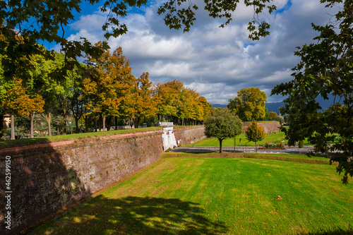 The Walls of Lucca public park. Porta Elisa (Elisa's Gate) with autumnal leaves