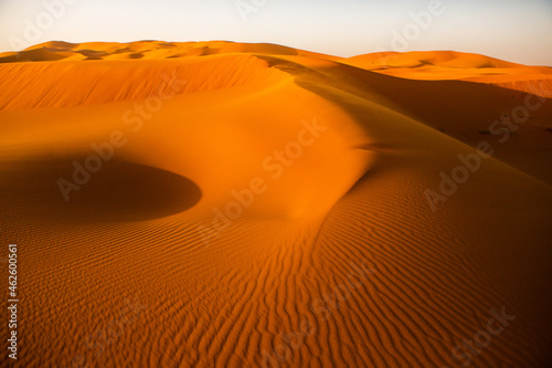 Beautiful sand dunes in the Sahara Desert in Morocco. Landscape in Africa in desert. © romeof