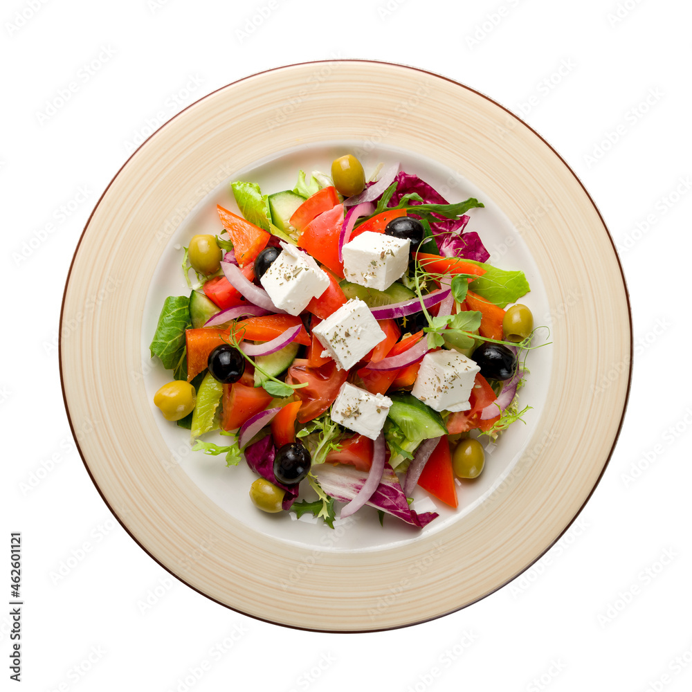 Greek salad with feta and fresh vegetables top view isolated on white background
