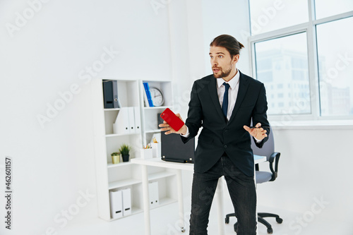 Wallpaper Mural businessman in the office with documents technologies Torontodigital.ca