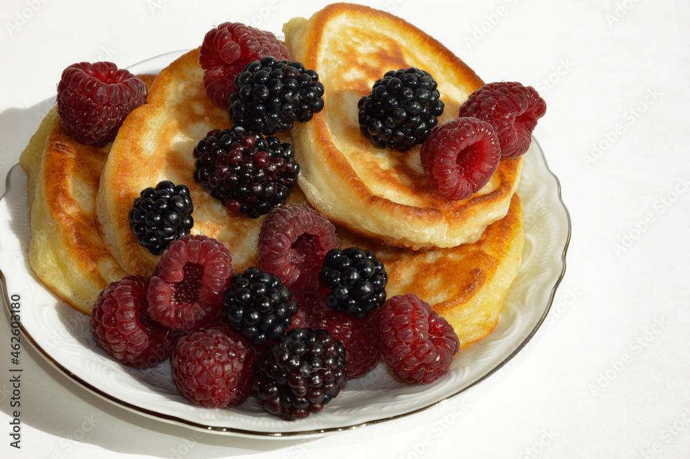 pancakes with fresh berries. breakfast food. dessert. pancakes with fresh berries. breakfast food. dessert.