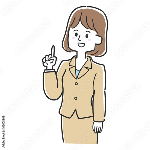 上を指差しているスーツの女性