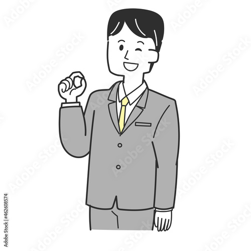 手で丸を作っているスーツの男性