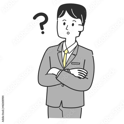 疑問を感じているスーツの男性
