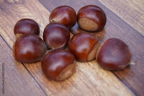 The chestnuts are just picked up and sparkle. The chestnuts look really delicious.