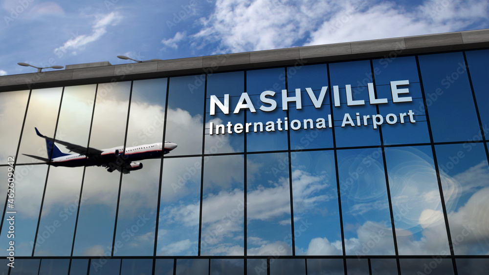Airplane landing at Nashville Tennessee, USA airport mirrored in