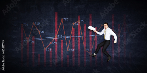 Business graph and trade monitor background and businessman . Mixed media