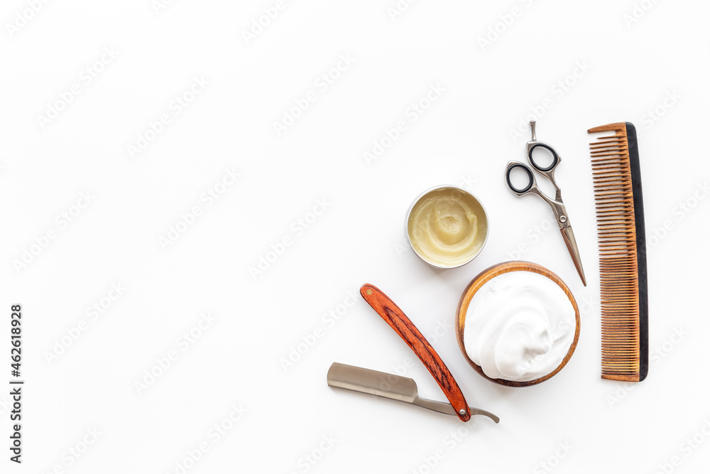 Brush foam shaver and shaving foam in wooden bowl, top view Brush foam shaver and shaving foam in wooden bowl, top view