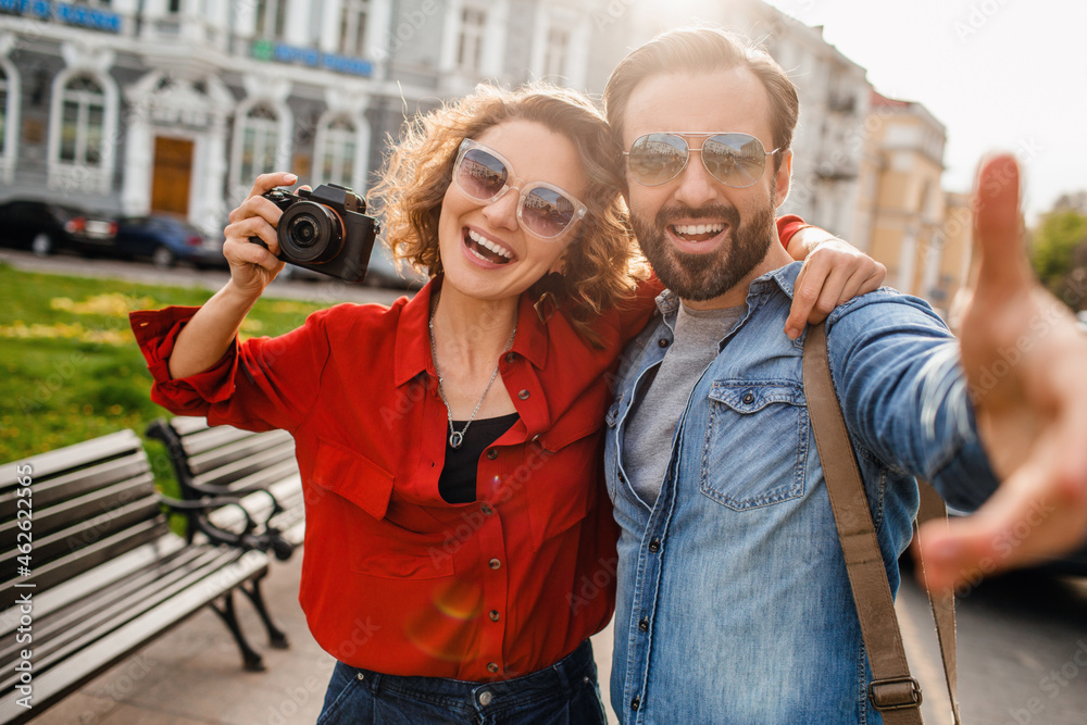 man and woman on romantic vacation walking together man and woman on romantic vacation walking together