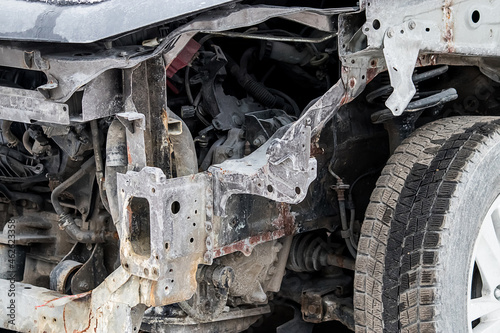 Broken car after accident on road. Auto without bumper and headlights. Insurance concept. © Galina Atroshchenko