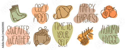 Set of hand-drawn autumn hygge mood vector icons in doodle style and lettering. Cozy cute cartoon elements collection and motivational phrases isolated on white background for seasonal decoration.