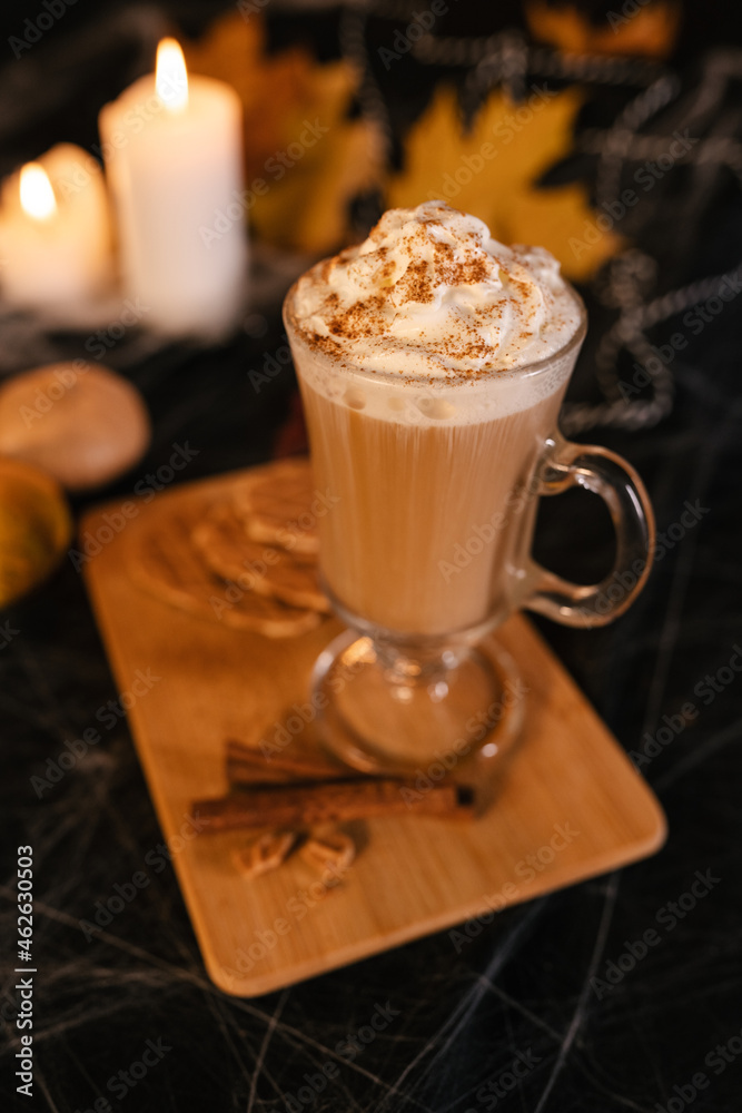 Halloween Latte. Spicy Latte Coffee in Halloween Decorations. Pumpkin, Latte, Halloween, Commercial Content Halloween Latte. Spicy Latte Coffee in Halloween Decorations. Pumpkin, Latte, Halloween, Commercial Content