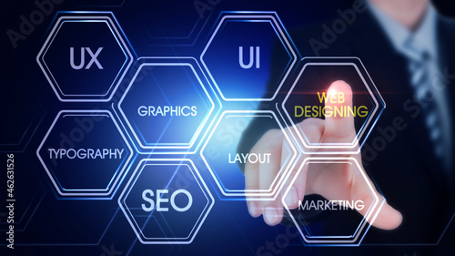 Web Designing
Hexagonal virtual Touch Screen Concept with man touching screen with finger and light streak
