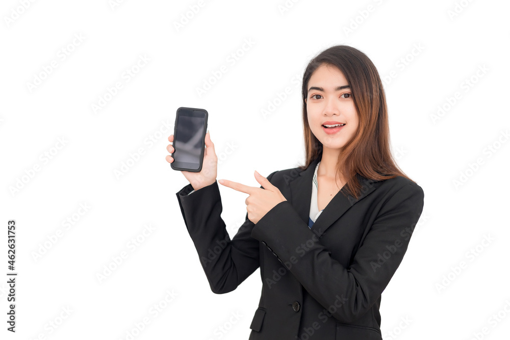 Beautiful Thai Asian woman wearing a black suit and smiling at the camera pointing her finger at the mobile phone she is holding against a white background. Beautiful Thai Asian woman wearing a black suit and smiling at the camera pointing her finger at the mobile phone she is holding against a white background.