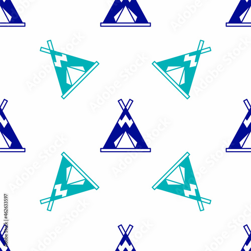 Blue Traditional indian teepee or wigwam icon isolated seamless pattern on white background. Indian tent. Vector
