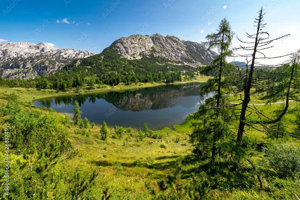 Scenic panoramic view of the Großsee mountain lake with the Traweng mountain in the background, Tauplitzalm plateau, Tauplitz, Ausseer Land, Austria