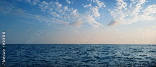 Beautiful blue sea and large calm waves .Travel Background.