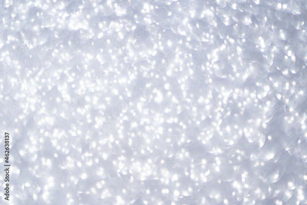 Bokeh circle with silver sparkles background. Grey glitter backdrop. Monochrome texture. New year luxury snow. Copyspace. Shimmer confetti wallpaper. Dreamy shiny design detail Bokeh circle with silver sparkles background. Grey glitter backdrop. Monochrome texture. New year luxury snow. Copyspace. Shimmer confetti wallpaper. Dreamy shiny design detail