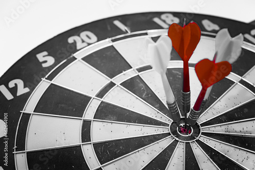 Bullseye is a target of business. Dart is an opportunity and Dartboard is the target and goal. So both of that represent a challenge in business marketing as concept. 