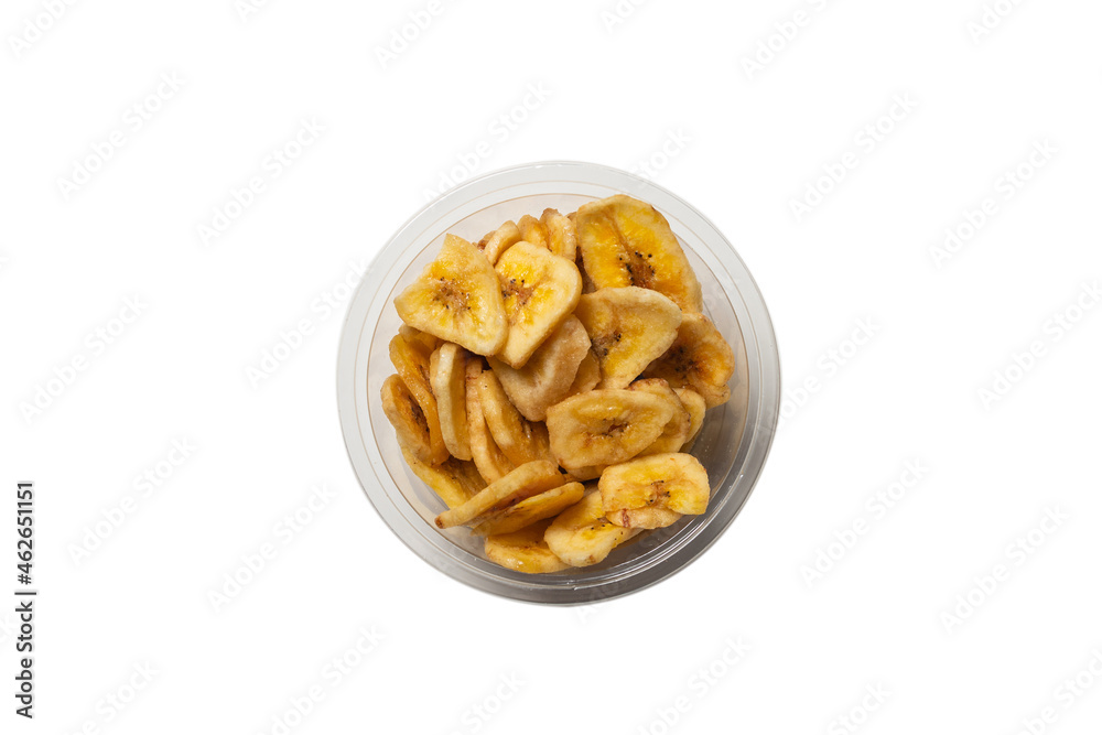 Banana chips isolated on a white background. Dehydrated banana. Banana chips isolated on a white background. Dehydrated banana.