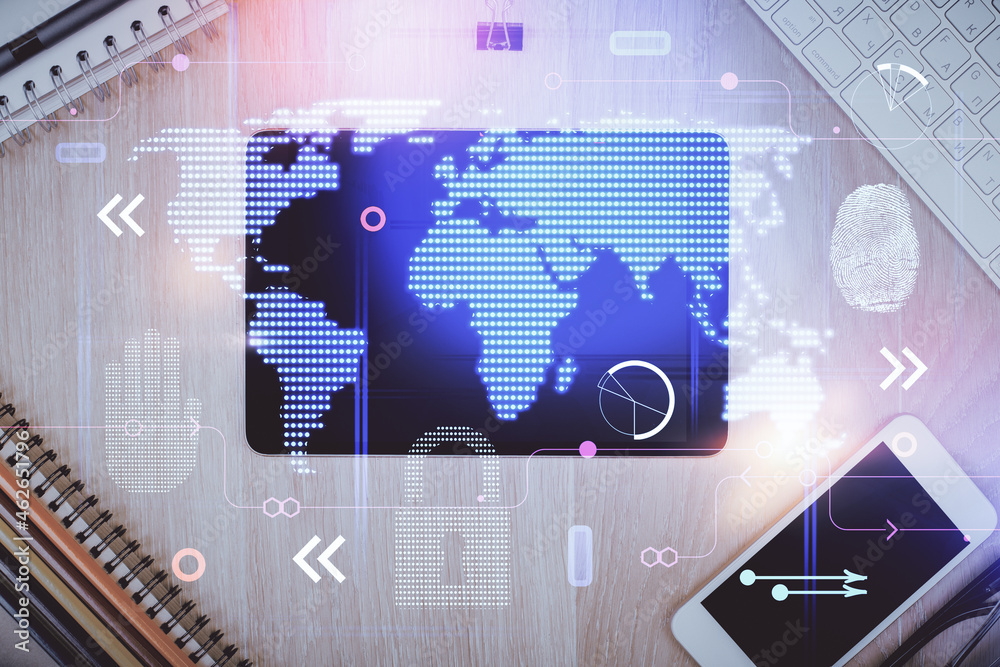 Double exposure of map hologram drawing over desktop. Top view. International connection concept.