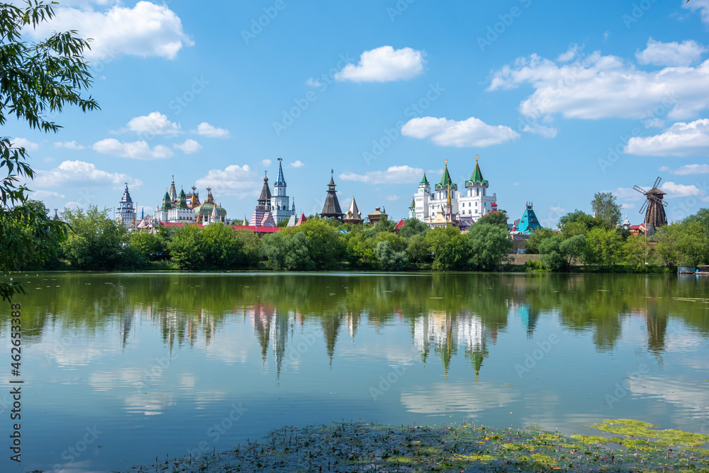 Castle Kremlin in Izmailovo and its reflection in the Serebryano-Vinogradny pond in Moscow, Russia