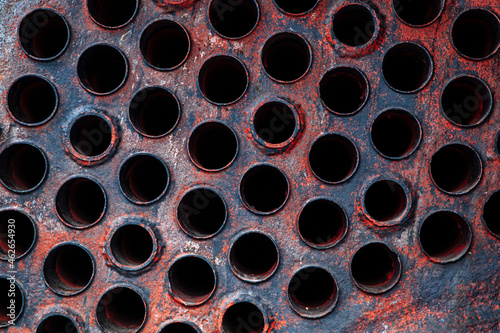 Industrial metal plate background with holes