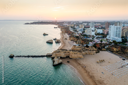 Aerial view of the coast in Portimao by sunset, Algarve, Portugal photo
