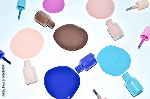 Nail polish (enamel) mixed multicolor samples, isolated on white background