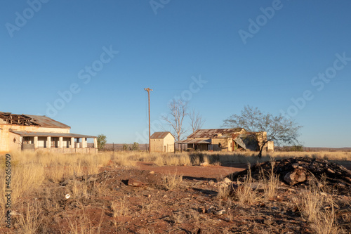 The old derelict buildings at the abandoned railway town called Putsonderwater, ghost town in South Africa. photo