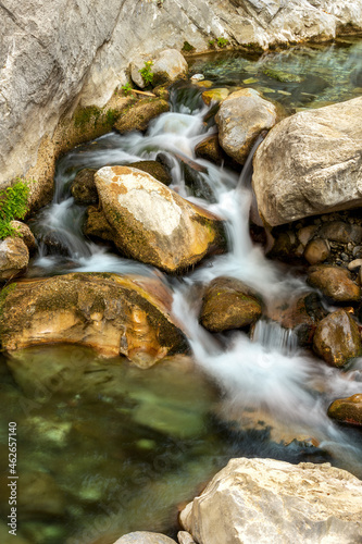 Mountain river flowing among the stones.