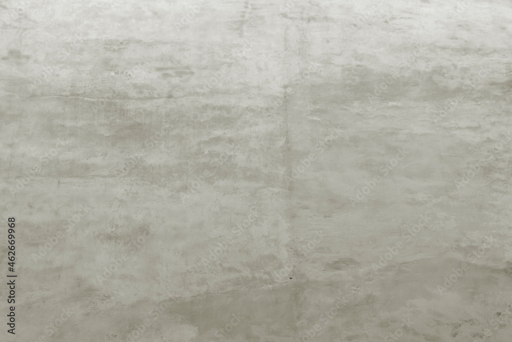 Naklejka premium Shabby wall of an old house with uneven crumbling plaster. Yellow-gray abstract texture.