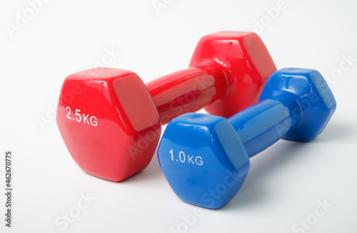 Simple Dumbbell. Sport equipment. Blue and red dumbbells for fitness on a white background.