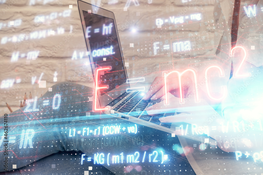 © peshkova - Double exposure of woman hands typing on computer and formula hologram drawing. Education concept.