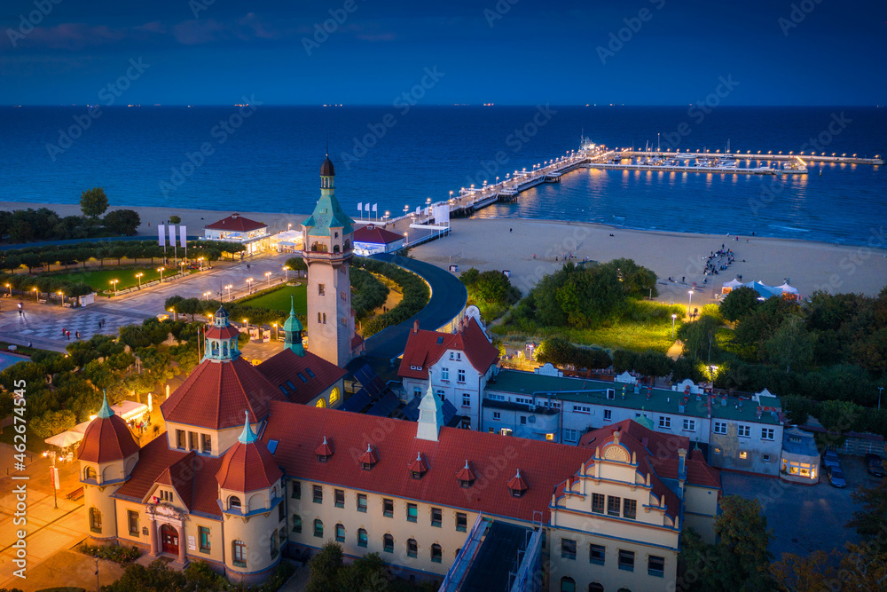 Beautiful architecture of Sopot city at the pier (Molo) by the Baltic Sea at dusk, Poland. - obrazy, fototapety, plakaty 